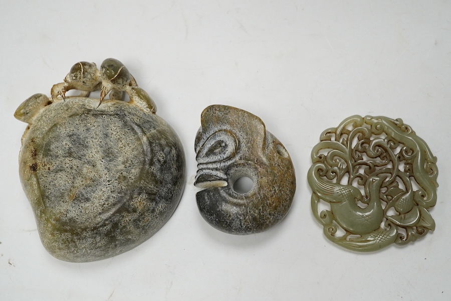 A 19th century Chinese reticulated celadon jade disc, 6.5cm diameter, a Ming style peach shaped brushwasher and a neolithic style carving. Condition - good